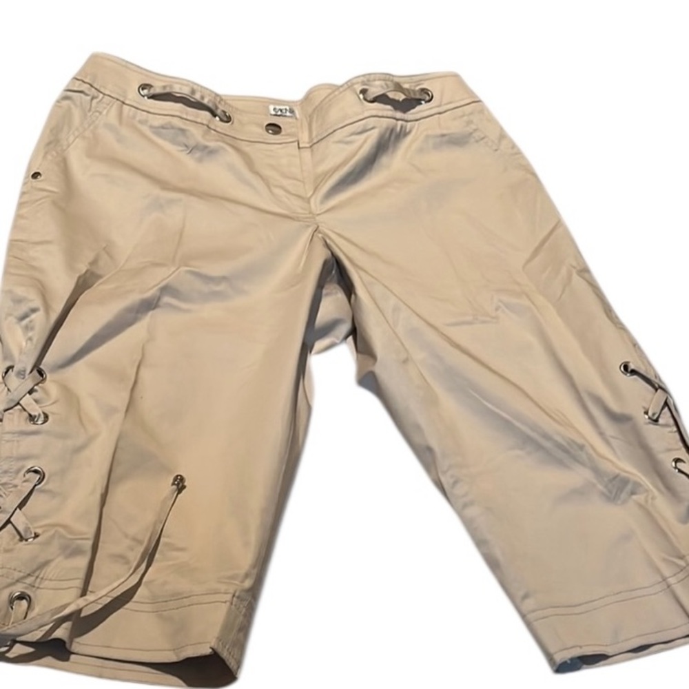 Cache size 12 tan cropped / capri pants with lace up outside of leg